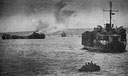 COAST GUARDSMEN ON LST-760> WATCH AMERICAN AMMUNITION DUMP GO UP ON IWO<