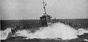 BULLING ITS WAY THROUGH A HEAVY SEA IS THE COAST GUARD MANNED LCI(L)-350