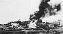 BLOWTORCH: A flame tank burns out Japanese positions in hillside tombs during the drive for Naha