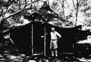 Lieutenant Colonel Frank D. Weir, USMC, Assistant Operations (Air), before his tent at Camp Crocodile, Guadalcanal