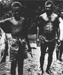 'Fish for Dinner.' Results of dynamiting the river at a native village on Guadalcanal.