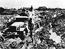 Overloaded Truck Towed Through Okinawa Mud