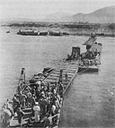 1006th Seabees Using a Three-Section Pontoon Causeway at Safta Beach