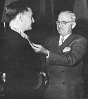 Lt. Comdr. A. Murray Preston, USNR, receives the Medal of Honor from President Harry S. Truman