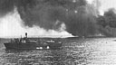 PT 297 picks up survivors of an LST hit by a suicide plane during invasion of Mindoro, December 15, 1944