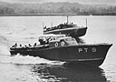 The Scott-Paine PT 9 paces PT 3, the Fisher Boat Works' 58-foot boat