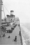 The SS Esso Albany under way. Completed for the Standard Oil Company of New Jersey, she was acquired by the navy after passage of the Two Ocean Navy Act of 1940. (National Archives)