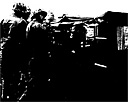 Figure 102.--A wounded marine brought to the beach by jeep ambulance from the
fighting front on Iwo Jima. Fifteen minutes later he was on his way to a hospital
ship off the shore of the island.