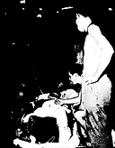 Figure 106.--Administering intravenous fluids in an abandoned Jap dugout.