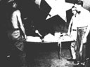 Figure 129.--Hospital facilities for enemy civilians were established at the earliest opportunity.
