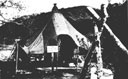 Figure 139.--Navy dentist administering dental treatment in one of the typical 
tent-type dental clinics at an advanced base.