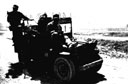 Figure 74.--Continuing first aid during transportation by jeep.