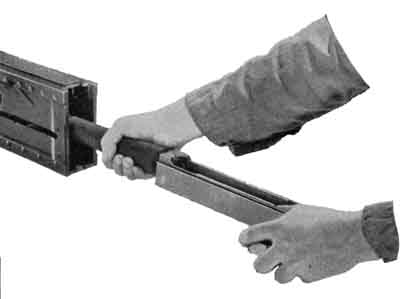 Removing tthe barrel group from the receiver