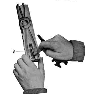Removing the sear assembly.