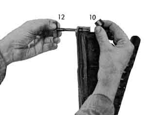 Taking off the cover latch.