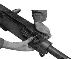 Inserting cover pin.