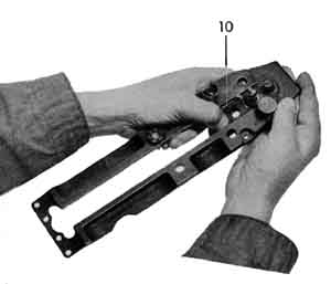 Removing the retracting slide.