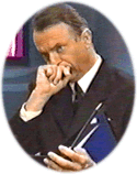 Photo of Sam Neill as Sam, CEO of City TransWorld