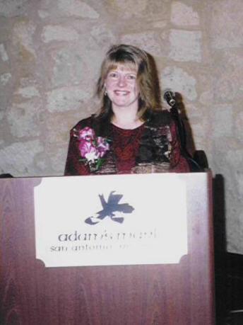 Debra Bade speaks after receiving the Shoemaker Award